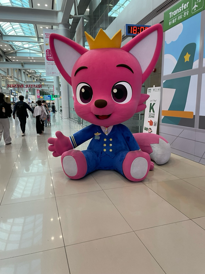 Pink fox mascot 