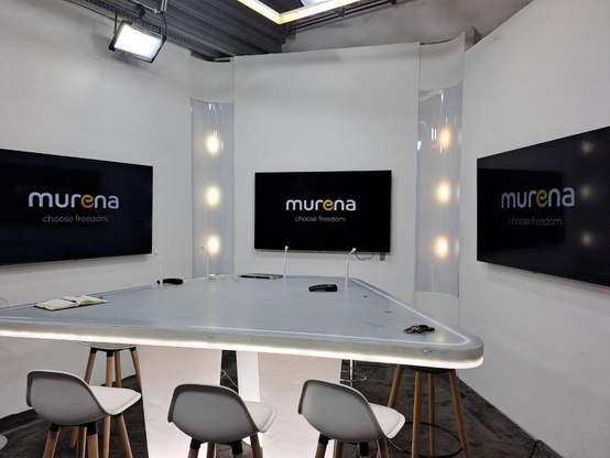 studio with 3 chairs and mics