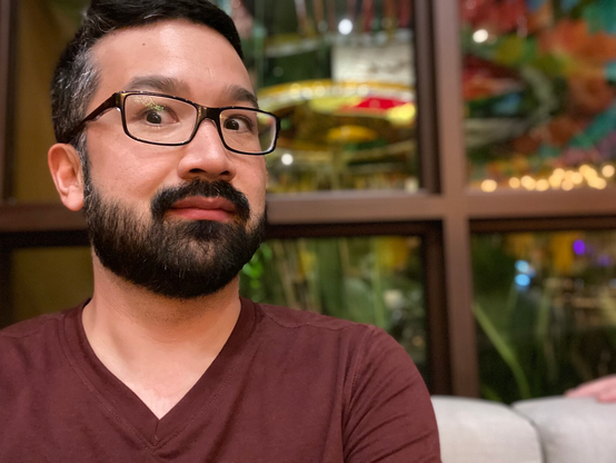 A selfie in Xcaret Arte. Crooked glasses. 