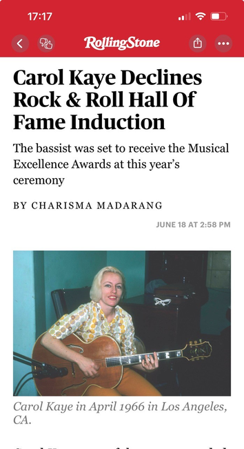 Screen cap from an article in Rolling Stone about Carol Kaye declining an induction in the Rock & Roll Hall of Fame. Photo of Kaye holding her Epiphone Emperor hollow body jazz guitar. 

Rolling Stone: Carol Kaye Declines Rock & Roll Hall Of Fame Induction 

The bassist was set to receive the Musical Excellence Awards at this year's ceremony BY CHARISMA MADARANG JUNE 18 AT 2:58 PM Carol Kaye in April 1966 in Los Angeles, CA.