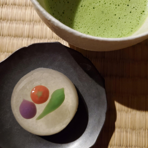 A jelly with a miniature eggplant, tomato and okura within.