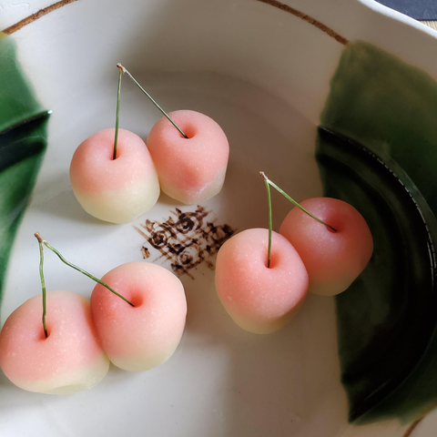 Soy flour and sugar crafted to look like cherries!