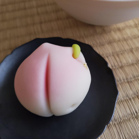Sweet in the shape of a peach bell (in celebration of Hinamatsuri).