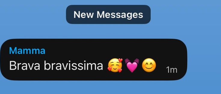 A screenshot of a message from my mom on Signal that reads “brava bravissima” and has a face with hearts emoji, pink vibrating heart emoji, and smiley 