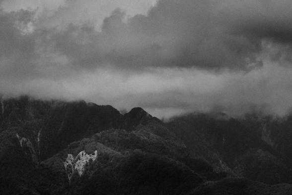 Mountains and clouds.