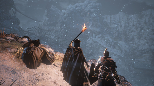 Dark Souls III screenshot

A witch, a figure in a mantle holding a torch and a knight stand at a ledge overlooking a vast canyon ahead of them. It's cold and snows heavily, the torchlight illuminating the party as they gaze off into the distance in a brief moment of respite.

I have spent a lot of time in the Painted World of Ariandel. My way of playing is rather unusual. I invade other people, not with the goal of killing them, like you are supposed to, but rather to lend my knowledge of the world to guide a host safely through it.

Wandering the wintery wasteland, I've made many memories and friends. It grew from just a goofing around into a whole roleplaying routine and even a small story line. It's my single favorite thing I have done in games ever, and I am thankful for everyone who had the curiousity and trust to let it happen over the years.