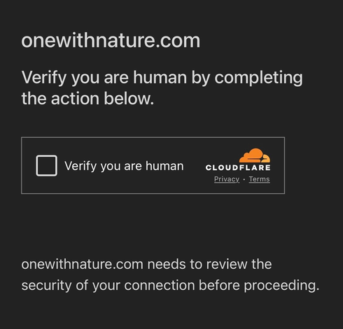 Screenshot of a website gate that reads “one with nature dot com. Verify you are human by completing the action below.”There is a checkbox with the label “verify you are human.”Then more copy that reads “one with nature dot com needs to review the security of your connection before proceeding.”