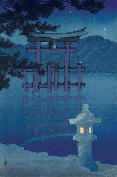 Evening at Itsukushima Shrine, Miyajima, in Hiroshima Prefecture. In the foreground, a stone lantern stands on the shore, lit and glowing; beyond, the calm waters of Matsushima Bay stretch out to where the famous 'floating' torii gate stands. Further on, forested mountains cross the horizon under a clear starlit sky.