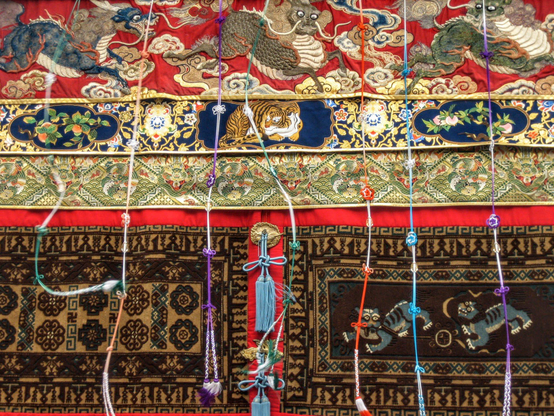 Gorgeous tapestries and brocade hanging from one of the Gion Matsuri festival floats.