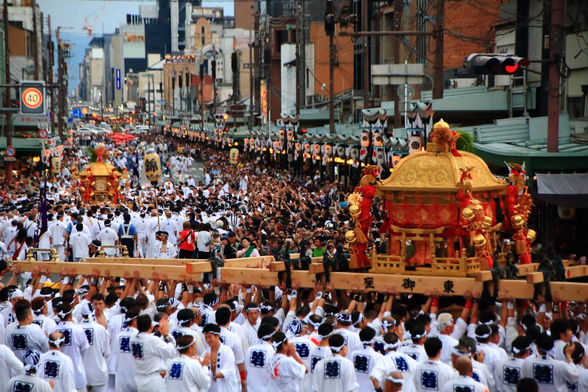 The gods of Gion are transported by divine palanquin into the heart of the city for Gion Matsuri's parades (which mark the start and finish of the gods' holiday).

Photo thanks - kyotomoyou.jp and https://kyoto-tabiya.com