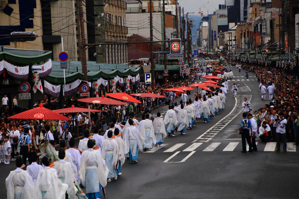 The gods of Gion are transported by divine palanquin into the heart of the city for Gion Matsuri's parades (which mark the start and finish of the gods' holiday).

Photo thanks - kyotomoyou.jp and https://kyoto-tabiya.com