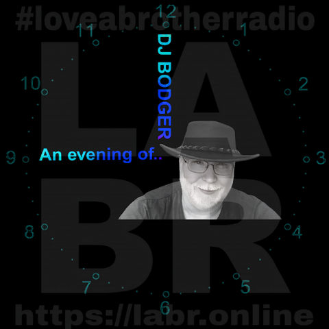 Black Background. LABR Logo in deep dark grey. #lloveabrotherradio on top. https://labr.online on the bottom. A army green colored clock with numbers and dots covering the entire image. The hand set at 9 o'clock is the short hand and the hand is made out of the name of the show. "And hour of..." The min. hand set at the 12 and is made out of his name. DJ Bodger. A black & white picture of DJ Bodger. White British male with glasses, wearing an Aussie. cowboy hat. Grey manicured beard. Black t-shirt