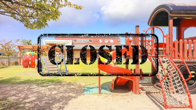 A playground with a "CLOSED" stamp over it