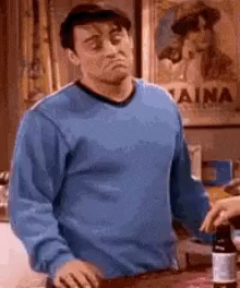 Joey from Friends shrugging