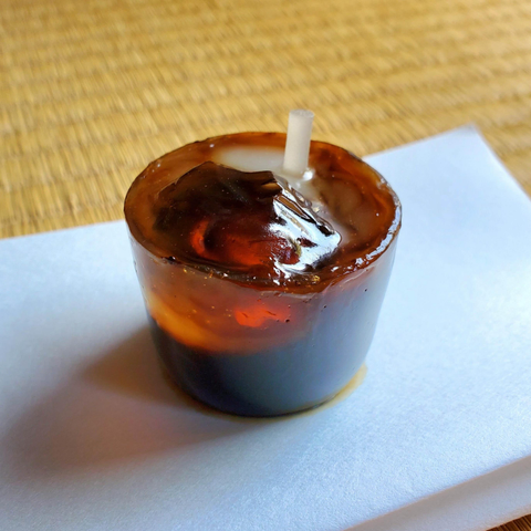 An adorable mini jelly crafted to look like an iced coffee.