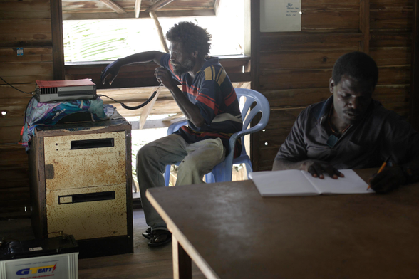 The Climate Refugees at Han Island, Carteret Atoll, Papua New Guinea. 
They have neither power nor internet.
They communicate with this battery powered rusty radio to the outer world.