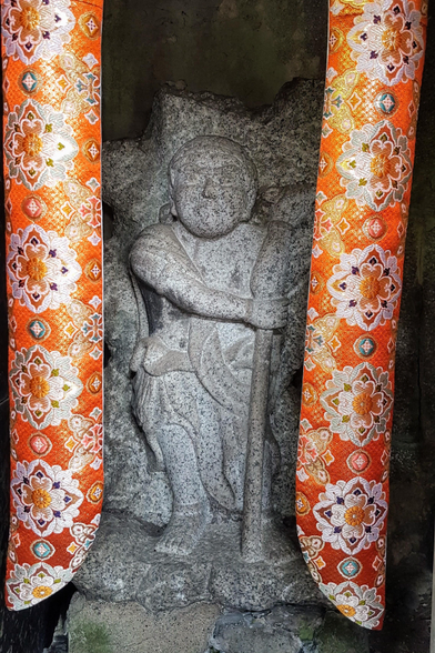 Statue of Fudo Myoo's attendant enshrined at the Otowa-no-taki.