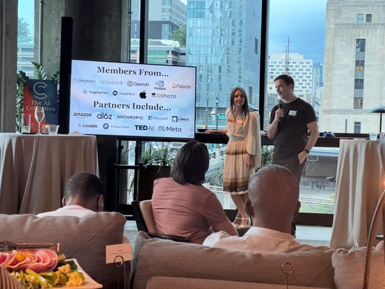 Photo of two hosts talking about the AI Collective mission.