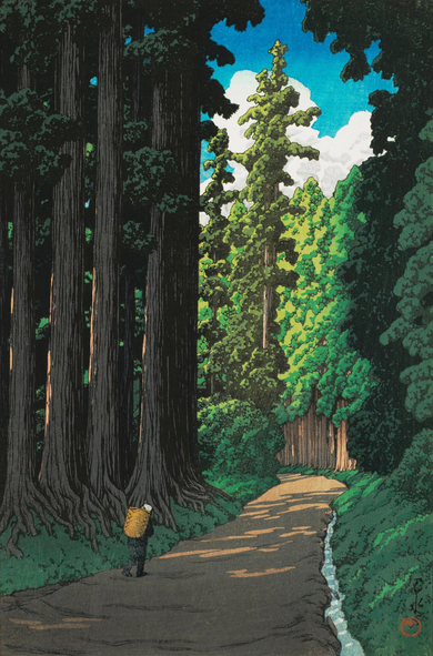A solitary figure carrying a large woven basket on their back trudges along the Nikko Kaido, one of the old routes connecting Edo and Nikko. The road is narrow, flat and unpaved; dappled sunlight falls across its surface. Growing close on either side of the road, tall green cryptomeria tower over the traveller, providing shade. Up ahead, a break in the trees allows the sunshine to stream in. Above, puffy white clouds populate an intense blue sky.
