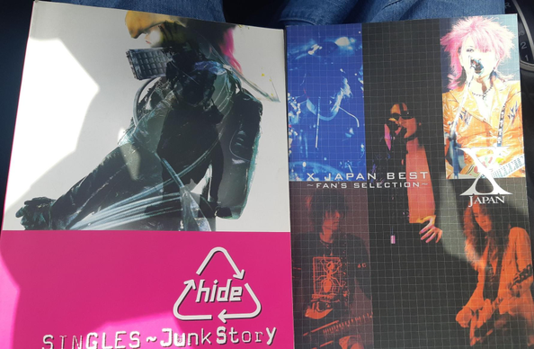 Photo of two Japanese music sheet books of Hide and X Japan