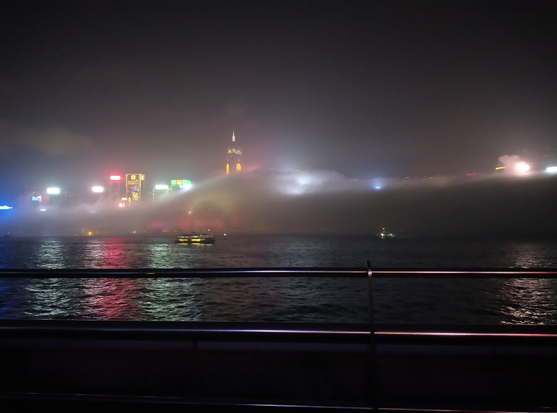 Hong Kong skyline in the night at a foggy evening.