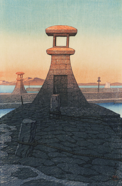 Sunset by the water in what was once Sanshu Province, now modern-day Kagawa Prefecture. A small stone lantern stands at the end of a solid stone pier, serving as a lighthouse; sunset warms the lantern, and colours the sky above with pale blue fading into yellow and deeper orange. Further on, another lantern stands on a similar pier. Beyond, the Seto Inland Sea is calm; further on, tall mountains cross the horizon in the distance. The lanterns are not yet lit for the evening.