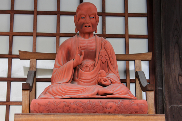 Seated statue of Binzuru.