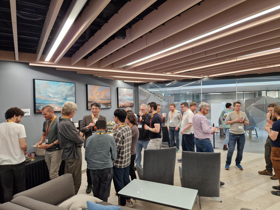 Core team chatting over coffee.