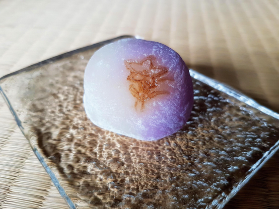 Another sweet inspired by Japanese bellflowers. The flower is branded onto the delicately purple gyuhi (a softer version of mochi) which surrounds a white bean paste interior.
