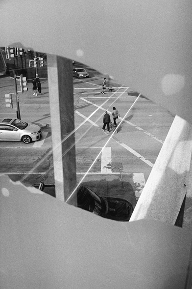 A busy intersection as viewed from above.
