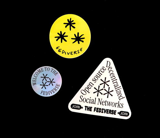 3 stickers with the asterism symbol used to represent the fediverse.