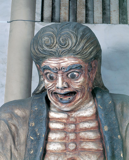 Statue of the hell hag 'Datsue-ba' (奪衣婆), who strips the dead of their clothes once they cross the 'River of Three Crossings',

Photo thanks - https://bunkakanko-annai.city.shinjuku.lg.jp