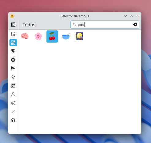 A screen capture showing the Emoji Selector and someone typing int "cere"... for "cerezas" (cherries) into the search box. The Selector is already responding showing pictures of cherries, cherry blossom, a brain "cerebro", etc.