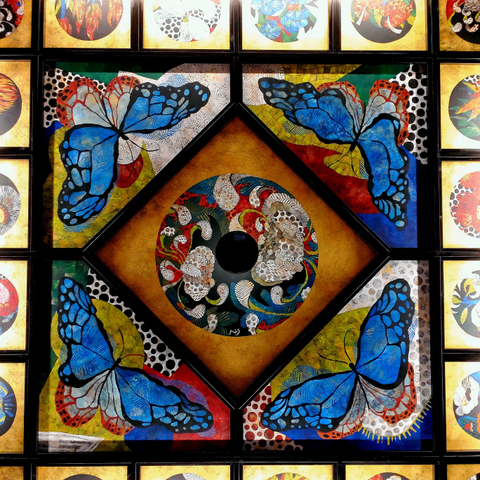 Sonyo-in's sumptuous coffered ceiling features paintings of flowers and butterflies on a gilded background.