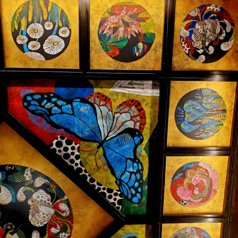 Sonyo-in's sumptuous coffered ceiling features paintings of flowers and butterflies on a gilded background.