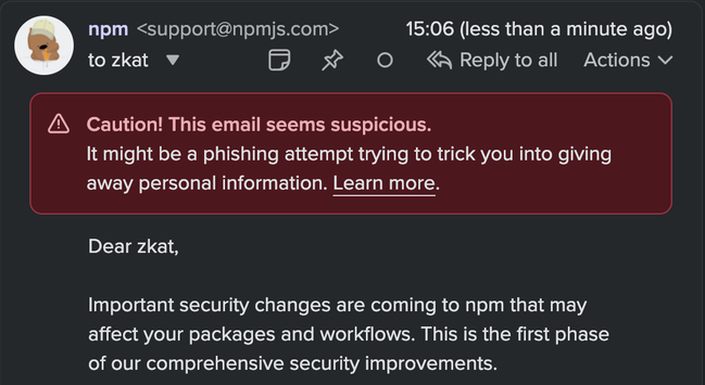screenshot of an email that clearly says it's from support@npmjs.com, a legitimate email address belonging to the NPM support team. Fastmail has flagged it as suspicious, and that it might be a phishing attempt. The email seems to be about some "security improvements".