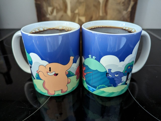 Coffee in two Mastodon mugs