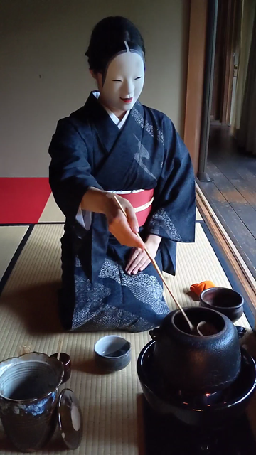 Nao-san is your spooky host (and it is not as easy as it looks to make matcha in a mask).