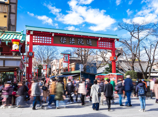 Tourists near a gate in Asakusa, Tokyo