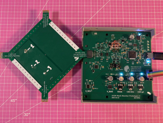 The final setup. On the right is the measurement board, and on the left is the mesh test specimen plugged in. In a real application, you would integrate both into your target circuit.