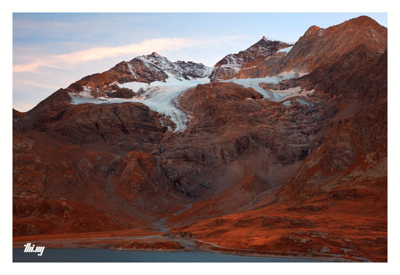 False-color barren glacial landscape near Bernina Pass, Switzerland.