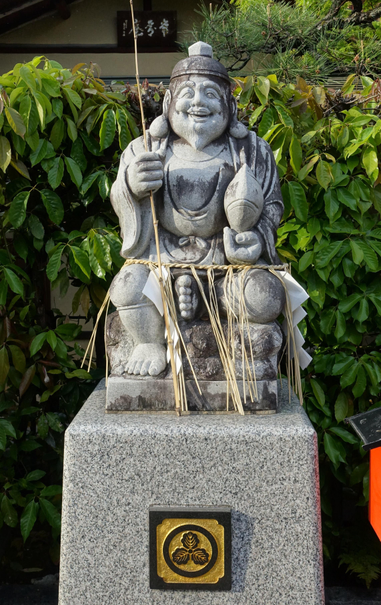 Statue of the god Ebisu in the grounds of Ebisu-jinja.