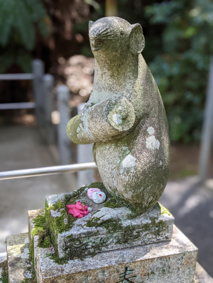 Mouse guardian (holding a scroll) at Otoyo-jinja.