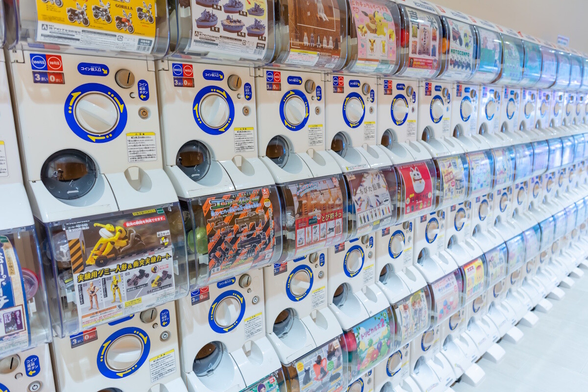 A row of capsule toy machines