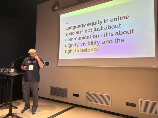 Photo of Jaz presenting.