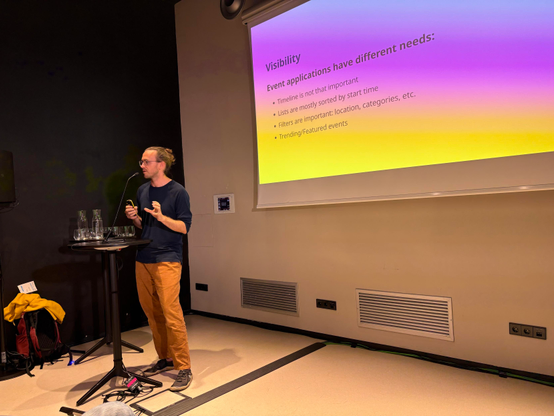 Photo of Andre presenting. 