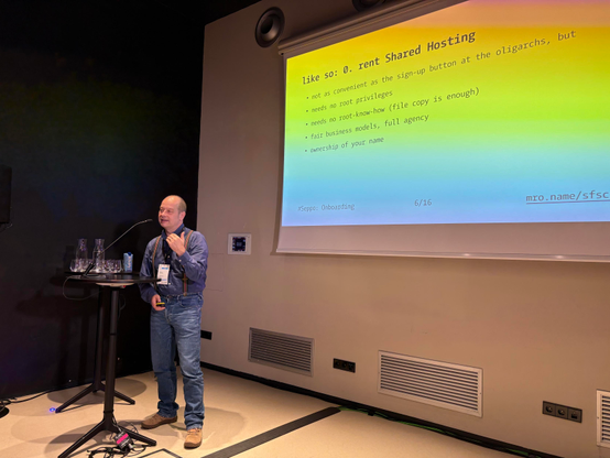 Photo of Marcus presenting. 