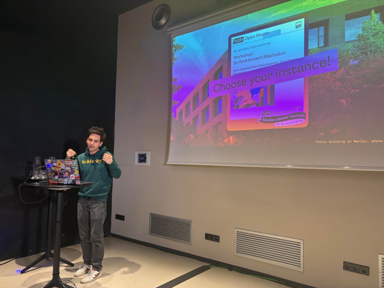 Photo of Harry presenting. 