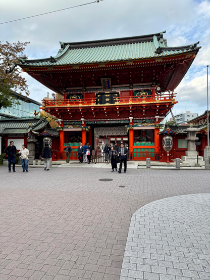 Passing the gate of Kanda Myojin Shrine in Tokyo, Japan