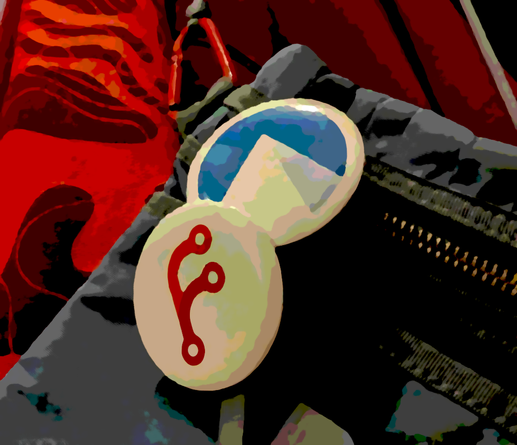 Bag with two pins. One has the Codeberg logo on it, the other one has the Forgejo logo. The image was mildly posterized using GIMP.